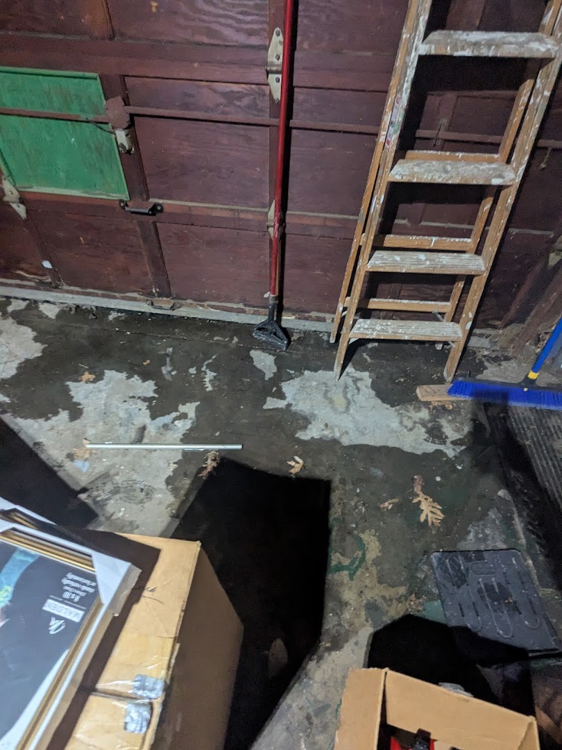 Before: Residential driveway and garage — Minneapolis, MN